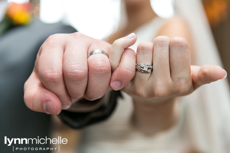 bride and groom rings pinky swear