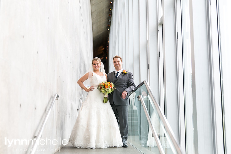 modern art museum portraits of bride and groom