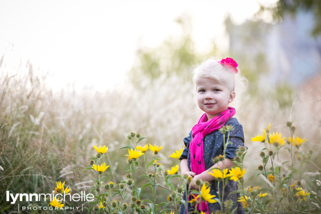 little girl in a field in downtown dallas