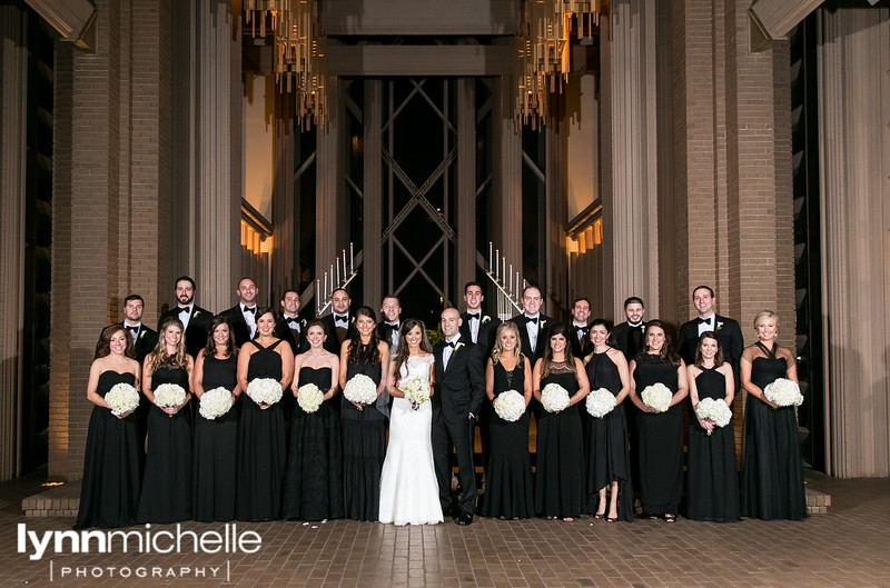 black and white wedding party at Marty Leonard Chapel in the evening