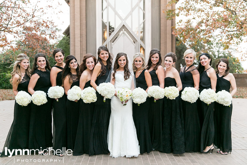 black bridesmaids dresses with white hydrangeas