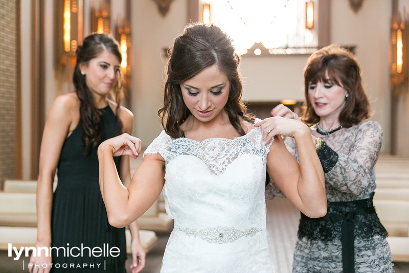 bride getting ready at Marty Leonad Chapel