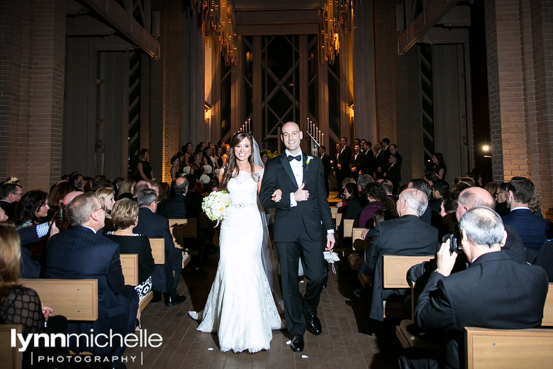 bride and groom exit at fort worth wedding chapel