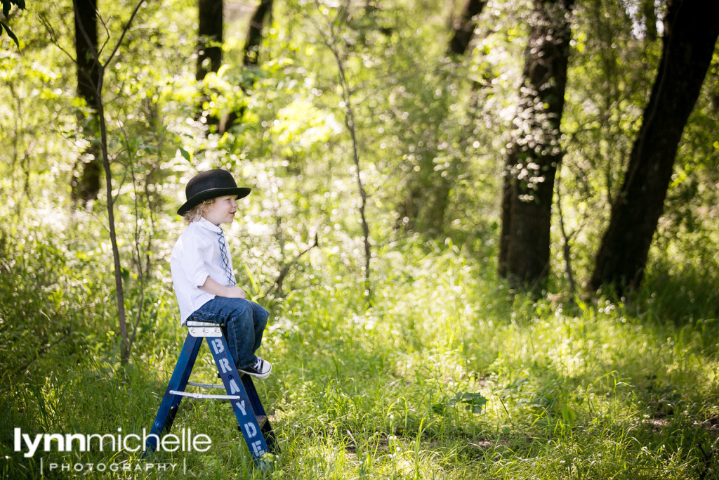 three year old wearing  a hat