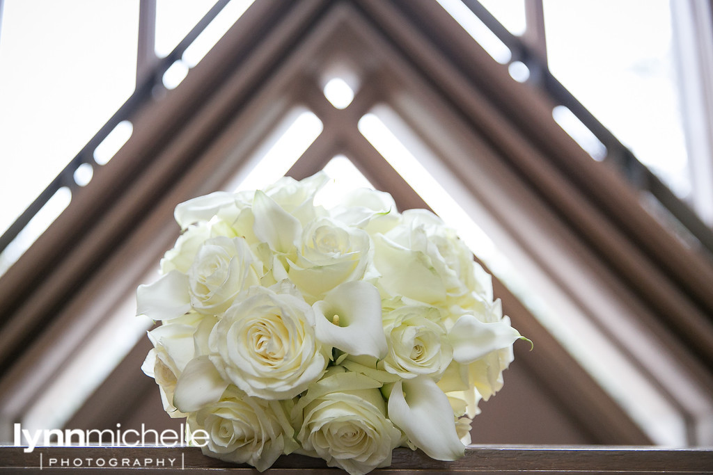 white roses and calla lily wedding bouquet