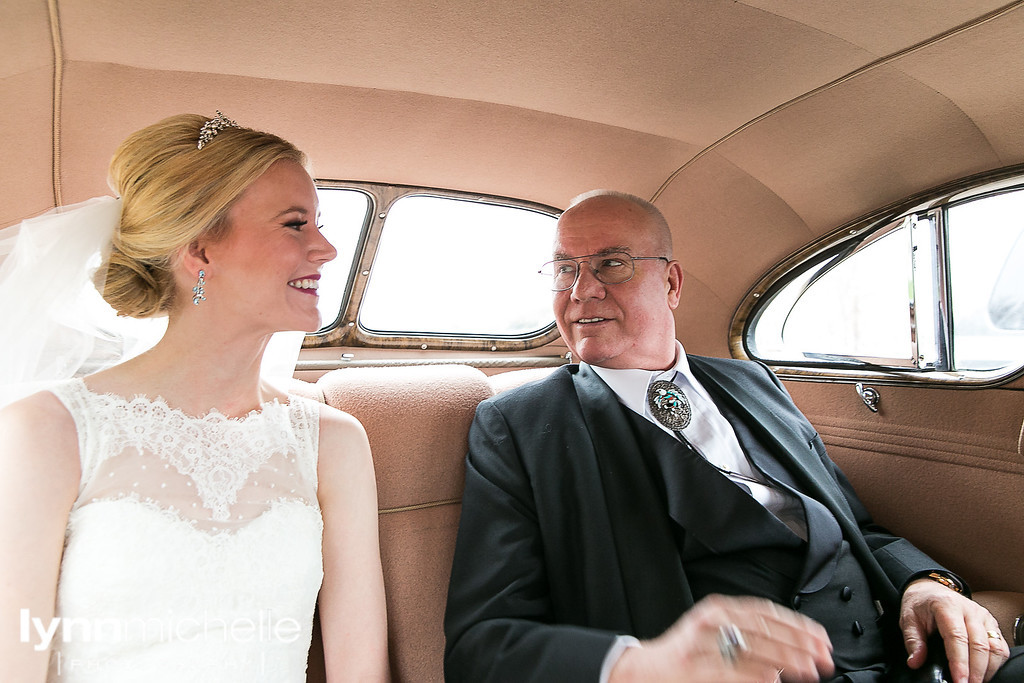 bride and dad riding in car to wedding ceremony fort worth