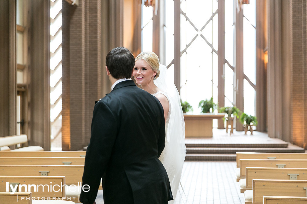 bride and groom first look at marty leonard chapel