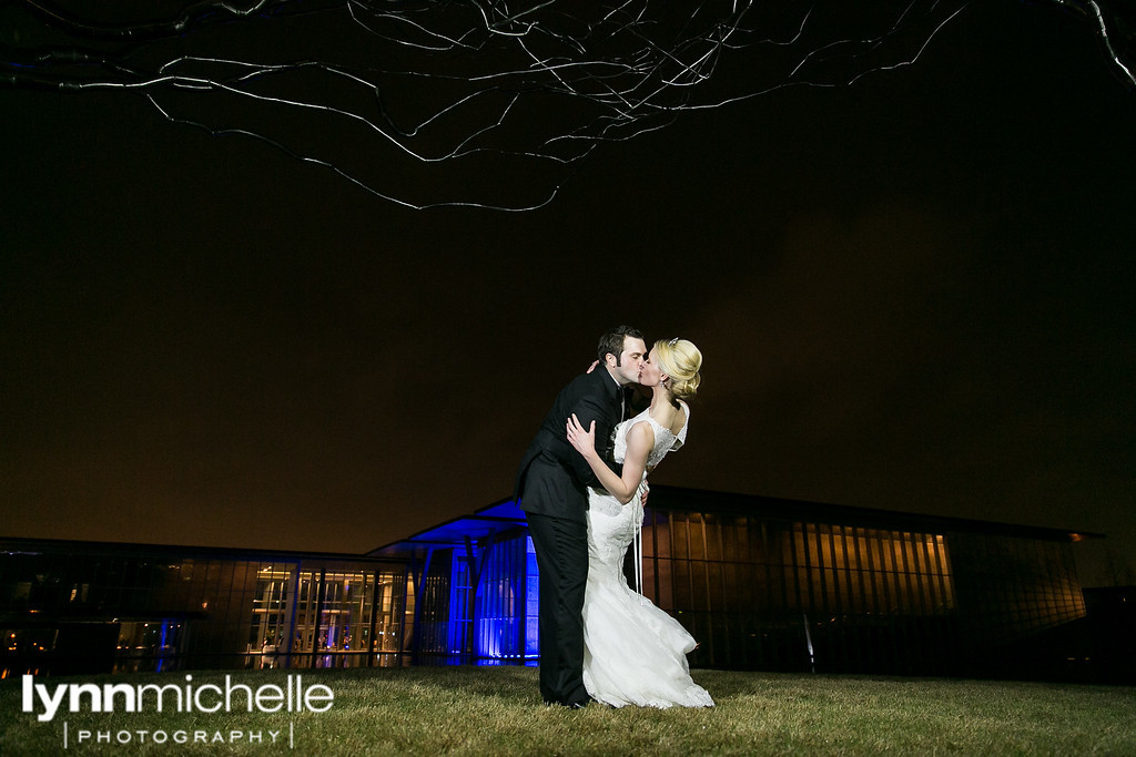 bride and groom outside modern art museum wedding