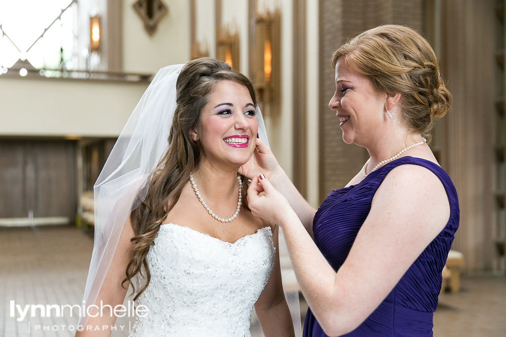 bride getting ready for wedding day at chapel